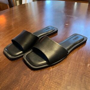 Black faux leather sandals